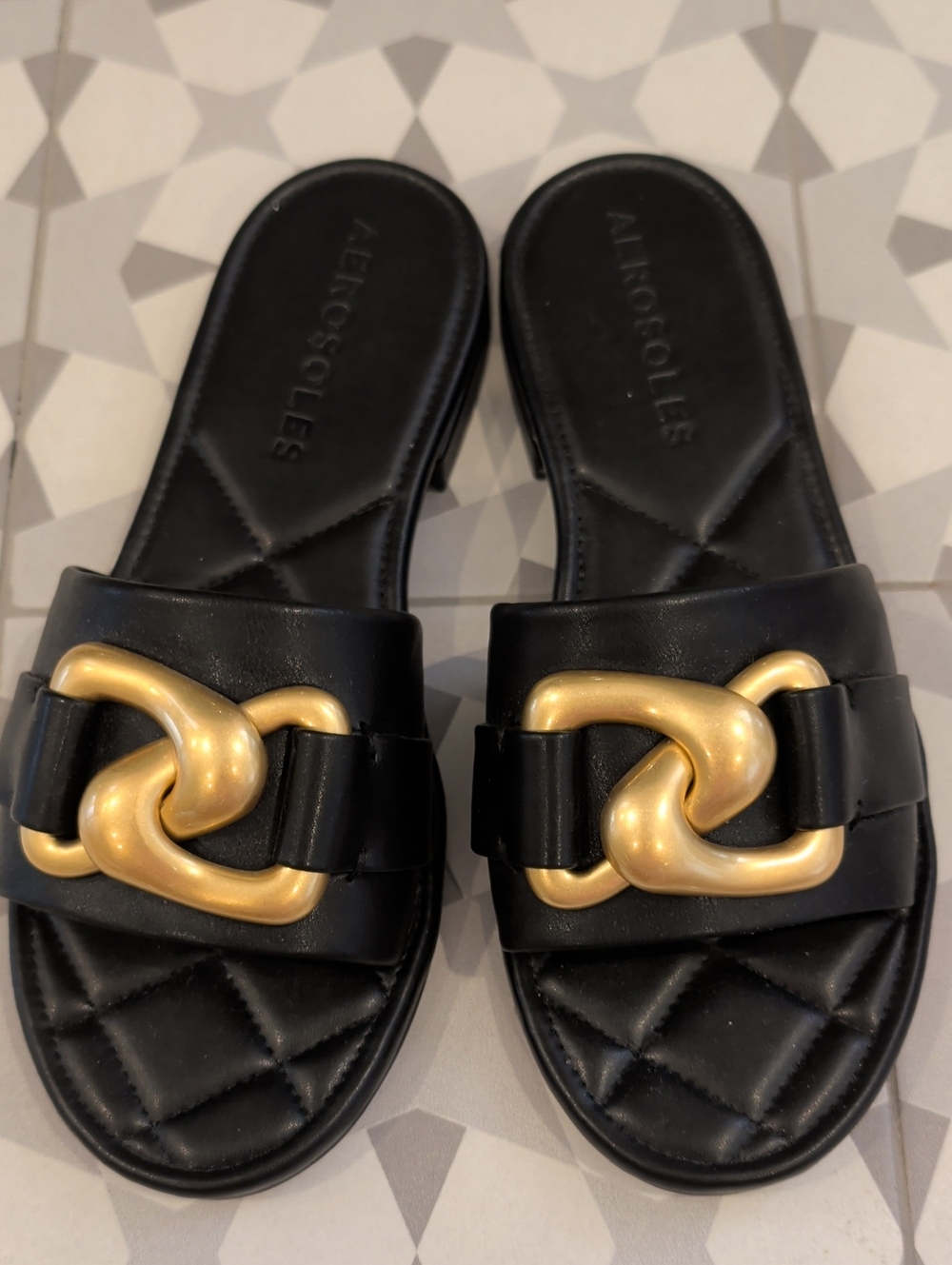 AEROSOLES Black Slide Sandals with Gold Chain Detail